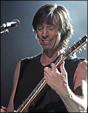 Tom Scholz preforms with Boston in a tribute to Brad Delp last night at Bank of America Pavilion.
