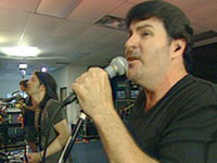 Tommy DeCarlo performs with the legendary rock band Boston after being plucked from obscurity to be the group's new lead singer.